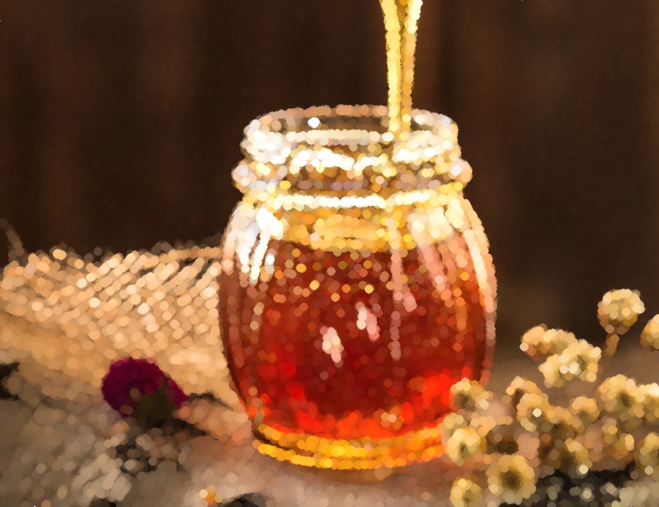 Honey into a jar sponge